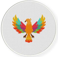 the cross stitch app is showing an image of a bird on it's screen