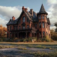 an old abandoned house sitting in the middle of a field