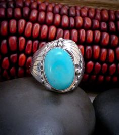 This wonderful Sterling Silver and Turquoise ring is handmade with skill by a Navajo artist. This is the perfect gift for that special someone! Size: 12 - This ring can be sized up or down within two sizes for an additional fee. Please send an email, if needed, before the time of purchase. Stone Measures: 7/8" x 5/8" Weighs: 17 Grams Stamped: Sterling Signed: JCY  This ring can be sized up or down by two sizes for an additional $25 fee. Ring Sizings take approximately 2 weeks turnaround. Add the following listing ID to your cart (253475134610) and send a note with the size you need. Send a message if you have questions. Please use the following link to add to your shopping cart at the time of purchase: https://www.etsy.com/listing/1014930924/ring-sizing-fee-only Thank you for shopping with Untreated Southwestern Style Ring Jewelry, Southwestern Turquoise Jewelry For Anniversary, Southwestern Style Large Turquoise Ring For Anniversary, Southwestern Style Large Stone Turquoise Ring For Anniversary, Handmade Southwestern Style Ring Jewelry, Handmade Southwestern Style Ring, Western Style Untreated Turquoise Ring Gift, Untreated Western Style Turquoise Ring Gift, Untreated Western Turquoise Ring As Gift