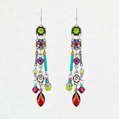 a pair of earrings with colorful beads hanging from it's earwires on a white background