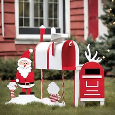 a mailbox decorated with santa clause and reindeer