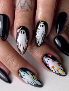 Get into the Halloween spirit with these simple yet chic nail designs for 2024! Featuring classic spooky elements like black cats and spider webs, these nails are perfect for a stylish and understated look. 🕸️ Whether you're dressing up or keeping it casual, these nails add the perfect Halloween touch. Explore more now! #HalloweenNails #SpookyStyle #NailInspo Simple Acrylic Halloween Nails, Sheet Ghost Nails, Cat Ghost Nails, Oval Acrylic Nails Short Halloween, Ghost Fall Nails, Halloween Star Nails, Hawollen Nails, Spooky Wedding Nails