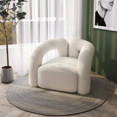 a white chair sitting on top of a wooden floor next to a potted plant