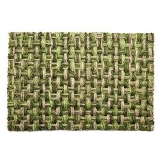 a close up view of a green and beige woven mat on a white background,