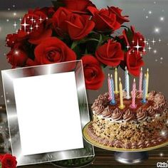 a birthday cake with candles and roses in front of a card for someone to write on it