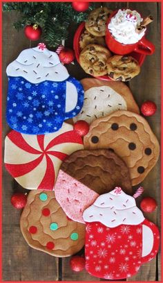 some cookies and other treats are on a wooden table with red, white and blue decorations