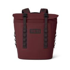 a red yeti cooler bag with black straps