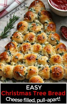 a cheesy christmas tree bread on a cutting board