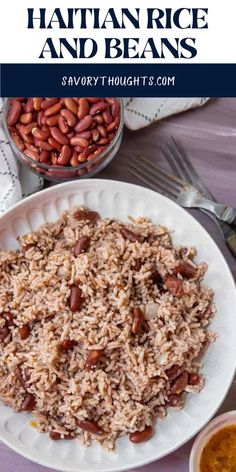 rice and beans on a white plate with spoons next to it