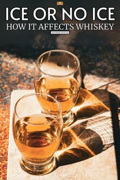 Here are a Close-up of two whiskey-filled glasses with bright light and shadows. The Ice, Blogger, Art