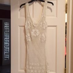 Nwot Cream Knit Dress With Flowers. Great To Wear A Fp Colored Tank Under It Or As A Sexy Bathing Suit Cover-Up. White Knit Mini Dress For Beach, White Knit Mini Dress For The Beach, White Crochet Knit Dress With V-neck, White V-neck Crochet Knit Dress, White Knit Mini Dress For Vacation, Cream Knit Dress, Cream Knitted Dress, Free People Lace Dress, Dress With Flowers