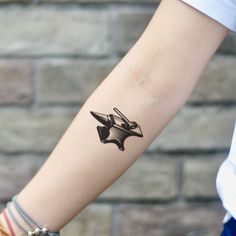 a person with a tattoo on their arm