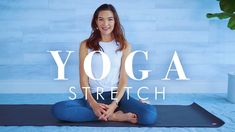 a woman sitting on a yoga mat with the words yoga stretch in front of her