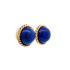 Add a touch of vintage elegance to your jewelry collection with these stunning Mid-Century Lapis Lazuli stud earrings. Crafted in 14k yellow gold, these earrings feature round cabochon cut Lapis Lazuli in a deep and rich blue hue. The stones have a total weight of 19.50 carats and are set in a twisted rope gold bezel, adding an intricate detail to these classic stud earrings. With their Mid-Century design, these earrings are a perfect addition to any vintage lover's wardrobe. Whether you're dressing up for a special occasion or adding a pop of color to your everyday look, these stud earrings are sure to make a statement. Luxury Blue Cabochon Earrings, Luxury Cabochon Clip-on Earrings For Formal Occasions, Elegant Yellow Gold Jewelry With Cabochon, Gold Clip-on Earrings With Gemstone, Elegant Yellow Gold Cabochon Jewelry, Elegant 14k Gold Gemstone Earrings, Elegant 14k Gold Earrings With Gemstones, Fine Jewelry Yellow Gold Cabochons For Formal Occasions, Yellow Gold Gemstone Cabochons