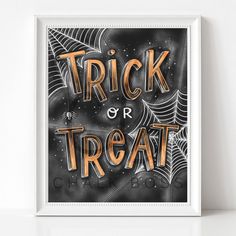 a trick or treat poster with spider webs on the front and orange lettering that reads trick or treat