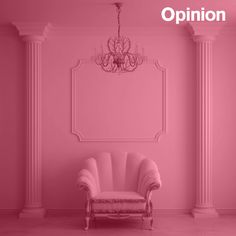 an empty room with a chair and chandelier on the wall, in pink tones