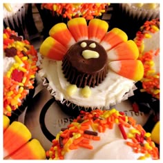 cupcakes decorated like a turkey and candy corn