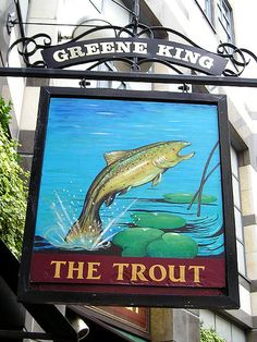 there is a sign that says the trout on it