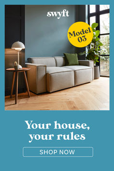 a living room with blue walls and wood flooring that says your house, your rules shop now