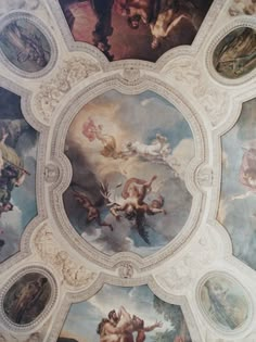 the ceiling is painted with many paintings and angels on it's dome, which reads ravenclaw