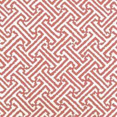 a red and white pattern on fabric