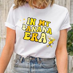 The "In My Banana Era" shirt is a vibrant and playful piece that exudes a sense of fun and carefree nostalgia. Crafted from high-quality, breathable cotton, this shirt ensures both comfort and style. The fabric is soft to the touch, making it perfect for everyday wear. ~ WHY YOU WILL LOVE THIS PRODUCT~ * Unique cute gift for everyone that is incredibly easy and stress-free to order & receive * Softest 100% cotton with a fit that runs true to size (unisex) * Our unique designs are professionally, Savannah Bananas, Funny Banana, Banana Shirt, Ice Cream Shirt, Future Teacher, Retro Shirts, Cute Gift, Birthday Shirts