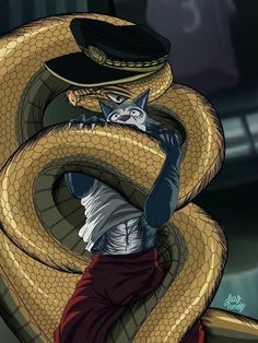 a person with a hat on their head is holding a snake