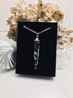 This is a unique icicle resin necklace! I created this pendant with many layers of crystal clear and blue uv resin! This is a beautiful necklace! This will make a great addition to your collection or as a special gift! Includes your choice of chain! I offer 18- and 20-inch sterling silver or 20-inch stainless steel(pictured)! (Please choose necklace choice at variations) Free domestic shipping on orders of $35 or more! My name is Deborah and my shop name is NakedNatureDesign and I'm a resin jewe Owl Necklace Silver, Flowers Pressed, Wanderlust Jewelry, Wood Resin Jewelry, Shop Name, Crystal Resin, Owl Necklace, Owl Pendant, Resin Necklace