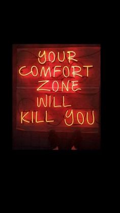 a neon sign that says, your comfort zone will kill you with the words on it