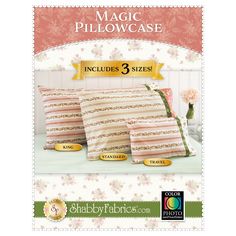 three pillows in pink and white stripes on the front of a package with gold trimmings