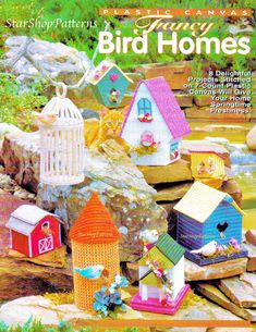 an advertisement for bird houses with cats and birds in them on the cover of a magazine