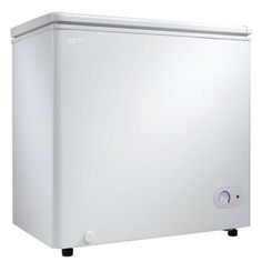 a white chest freezer sitting on top of a table