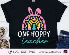 one hoppy teacher t - shirt with bunny ears and rainbows on the back