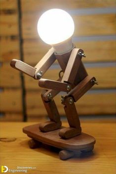 a wooden toy with a light on top of it