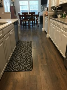 the kitchen is clean and ready for us to use it's new flooring