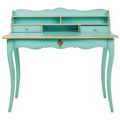 a blue desk with drawers on it