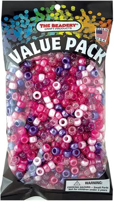 the beadery value pack is packed with pink, purple and white beads in a bag