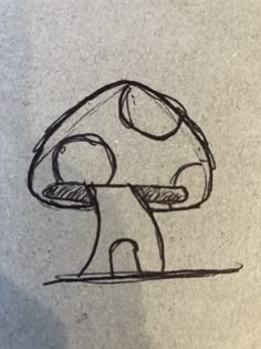 a drawing of a mushroom sitting on top of a table