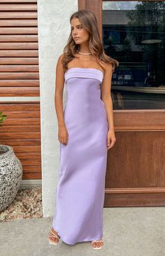 Lilac Maxi Dress

 HOW TO STYLE:

 You need this gorgeous maxi dress () for your next cocktail () event! Pair with gold jewellery () and steal the show in this amazing colour. 

 FEATURES:

   
 * Lightweight satin material
 
 * Slight stretch
 
 * Unlined
 
 * Strapless style
 
 * Gel grip on inner bust
 
 * Elasticated band at the back
 
 * Foldover bust detail
 
 * Invisible side zip
 
 * Bias cut 
 * Cowl draping at back   

 This dress is perfect for homecoming!

 This is the perfect formal Lilac Maxi Dress, Long Shift Dress, Tube Top And Skirt, Socialite Style, Gorgeous Maxi Dresses, Sleeveless Skirt, Satin Evening Dresses, Maxi Robes, Long Skirts