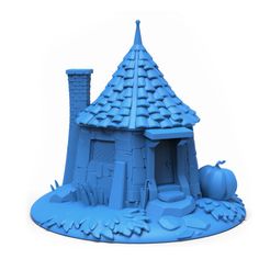 a blue plastic model of a house with a roof and chimneys on the ground