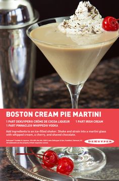 an advertisement for boston cream pie martini with cherries on the rim and cherry garnish