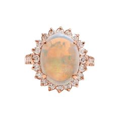 7.10 Carats Natural Impressive Australian Opal and Diamond 14K Solid Rose Gold Ring Amazing play of colors opal. Pictures don't show the beauty of the opal. Total Natural Opal Weight is: Approx. 6.00 Carats Opal Measures: Approx. 14.00 x 11.50mm Natural Round Diamonds Weight: Approx. 1.10 Carats (color G-H / Clarity SI1-SI2) Ring size: 7.5 (we offer free re-sizing upon request) Ring total weight: 6.2 grams SKU #1233 Ring Rosegold, Solid Gold Rings, Shiny Things, Australian Opal, Natural Opal, Quality Diamonds, Cocktail Rings, Estate Jewelry, Rings Statement