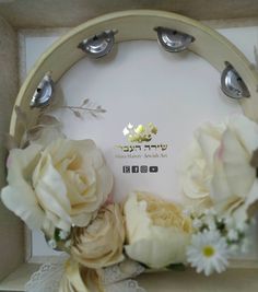 a white box with flowers on it