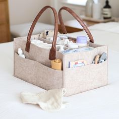 an open purse sitting on top of a bed