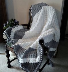 a chair with a blanket on top of it