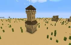 a small tower in the middle of a desert