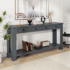 a grey console table with two drawers and an open shelf on one side, in front of a white wall