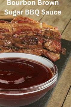 bourbon brown sugar bbq sauce in a bowl next to ribs