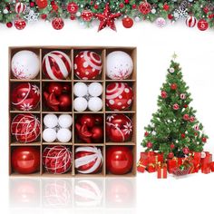 a christmas tree with red and white ornaments in a wooden box next to a decorated christmas tree