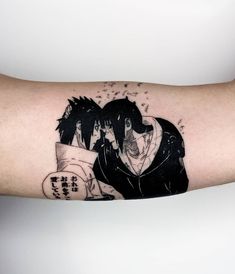 an arm tattoo with two anime characters on it, one holding the other's head